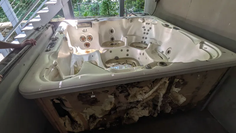 A hot tub on a deck ready for removal on a Peachtree Junk Removal job near Atlanta
